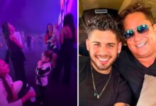 Zé Felipe no palco com seus filhos e Leonardo durante show em Goiânia.