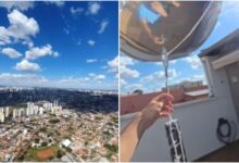 Estudante Pedro Augusto segurando balões de hélio com celular amarrado.