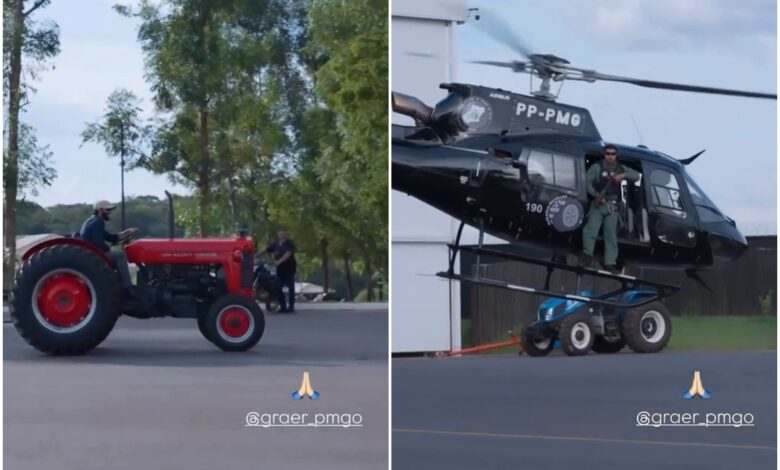 Gusttavo Lima em trator ao lado de helicóptero da polícia em sua fazenda.