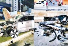 Cena do acidente na Avenida T-63 em Goiânia, com veículos danificados.