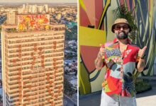 Vista do mural artístico no topo de um prédio em Goiânia.
