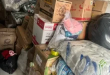 Doações de mantimentos e itens de necessidade básica organizados para envio à Venezuela.