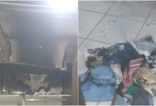 Quarto danificado por incêndio em Itumbiara após explosão de celular.