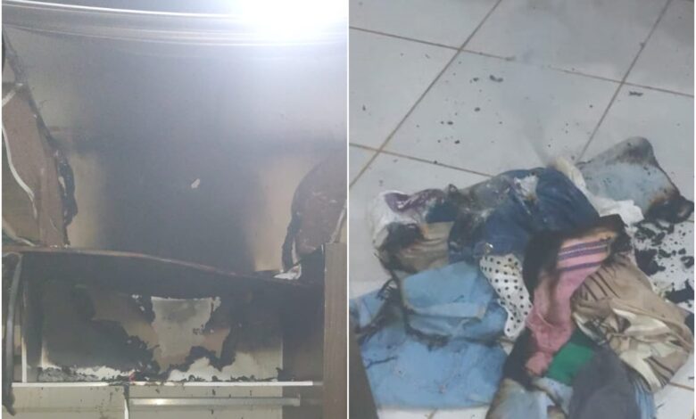 Quarto danificado por incêndio em Itumbiara após explosão de celular.