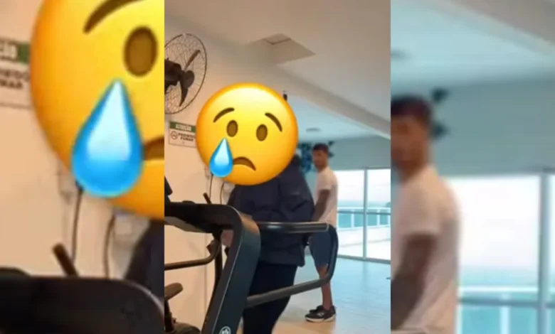 Interior de academia com equipamentos de ginástica.