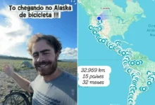 Lucca Cardoso pedalando em uma estrada com paisagem montanhosa ao fundo.