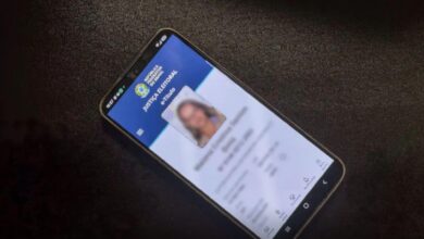 Tela do aplicativo e-Título em um smartphone.