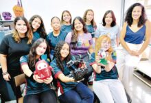 Mulheres participando de um workshop científico em Goiás.